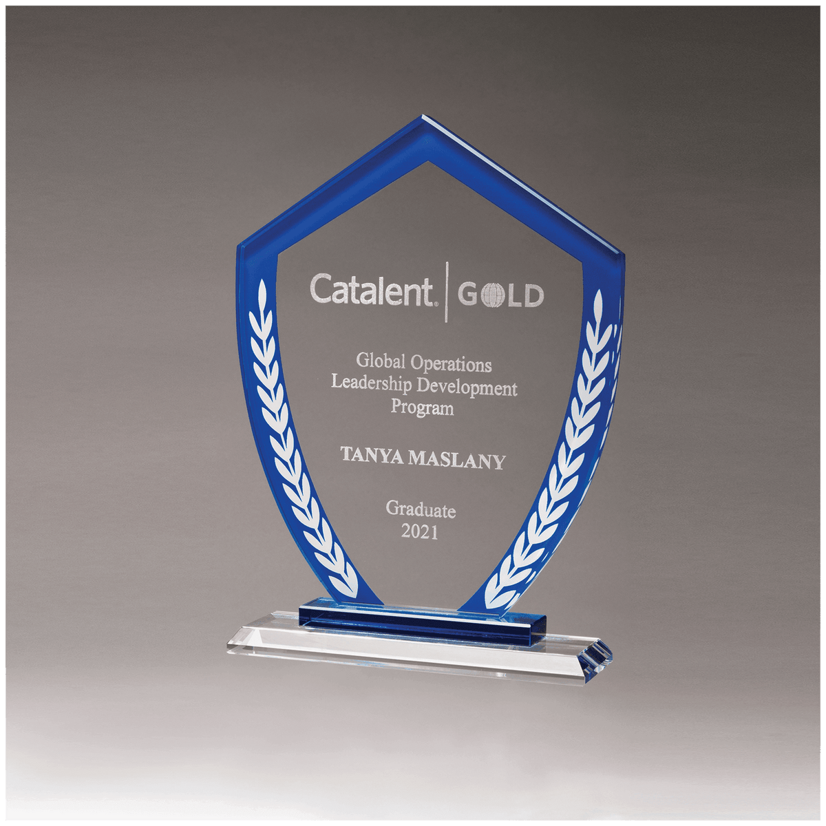 7 1/4" x 9 3/4" Shield Shaped Glass Award with Blue Border and White Laurel Leaves